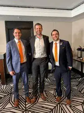Daily Stack team with business leaders at an industry gathering